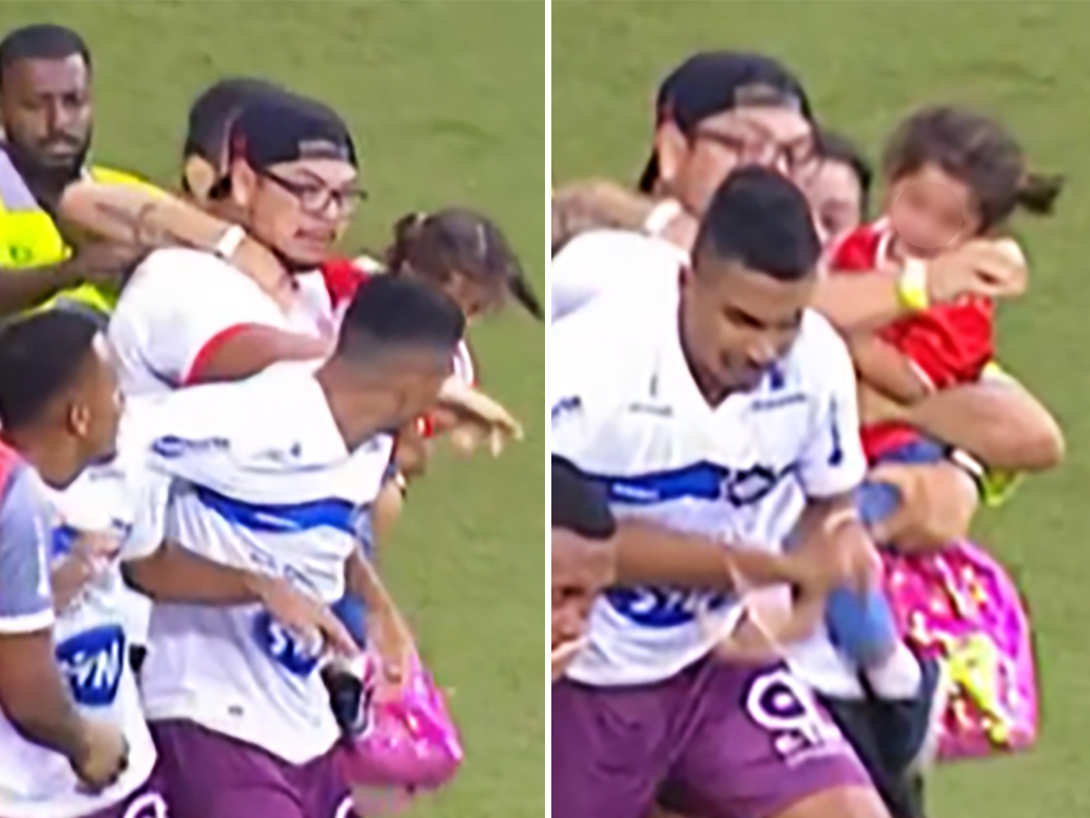  Jedan navijač u Brazilu je sa ćerkom u rukama uleteo na teren i šutuo protivnika 