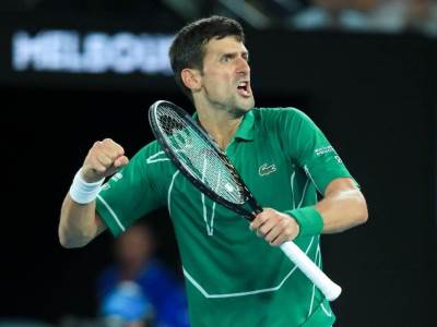  novak-djokovic-oprema-australijan-open-2021-zelena-majica-lacoste 