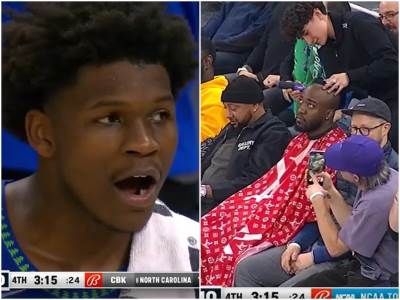  Navijač se šiša na NBA utakmici 