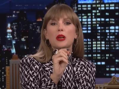  svi u soku kako tejlor svift drzi olovku 